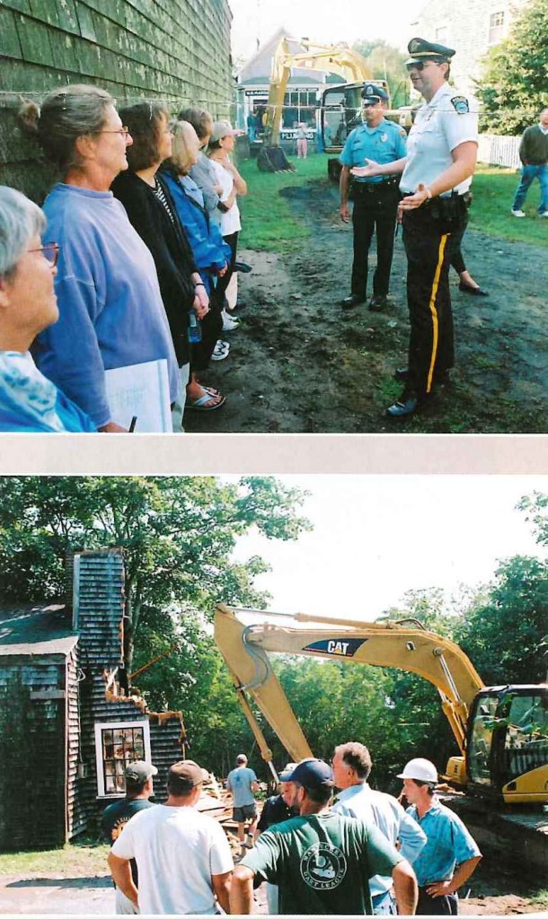 A photo in 2001 of island preservationists attempting to stop demolish of 106 Main Street